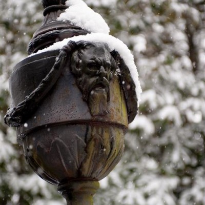 snowing on outdoor urn